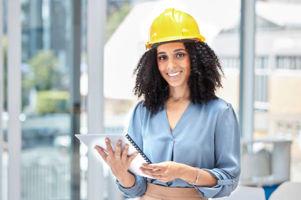 istock Architecture, plan and architect with a report for construction, building renovation and document for maintenance. Smile, designer and portrait of a creative worker with contractor paperwork 1475279036