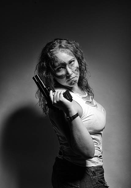 istock Serious woman with handgun 147527994