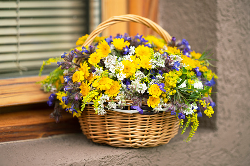 Bouquet of flowers in the basket