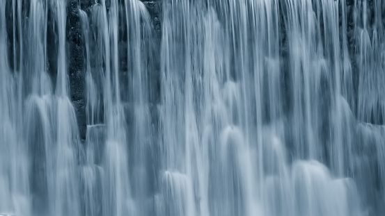 A high speed exposure of falling water of a waterfall.