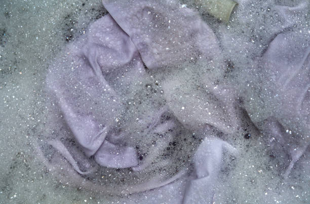 istock Top view of soak a cloth or sheets before washing, white sheets 1475284814