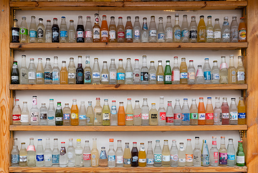 Ankara, Turkey- February 4 2023: Old soda bottle collection on the shelf