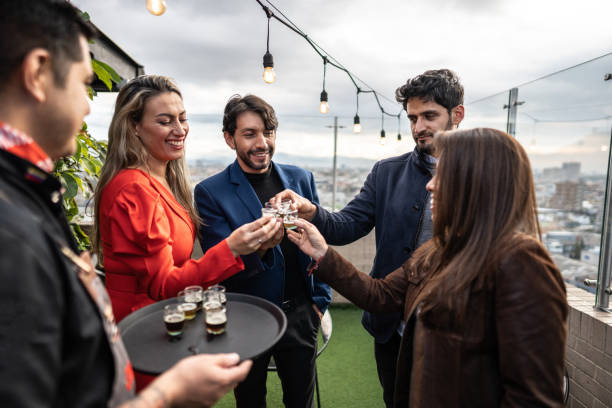 istock Coworkers making a celebratory toast in the rooftop restaurant 1475285722