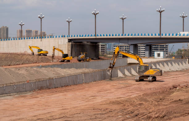 construction site of modern flyover with crane machines. stock photo