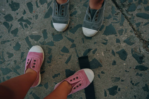 istock pink and gray sneakers 1475291711