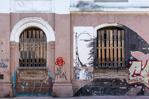 March 20, 2023: A street in Buenos Aires covered with graffiti. Photo taken during a hot summer day.
