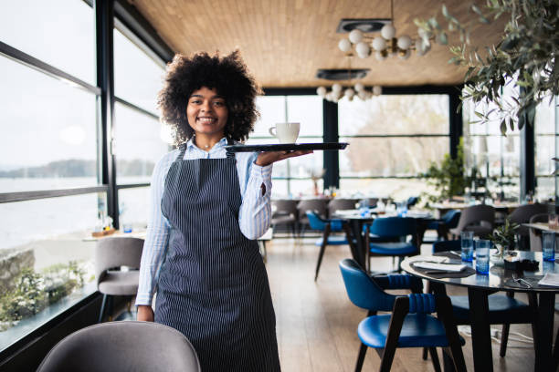 istock Portrait of a young waitress 1475298466