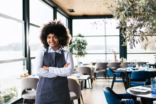 istock Portrait of a young waitress 1475298472