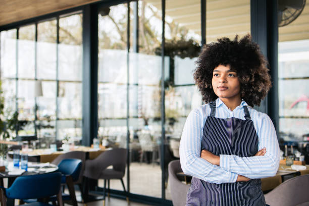 istock Portrait of a young waitress 1475298486