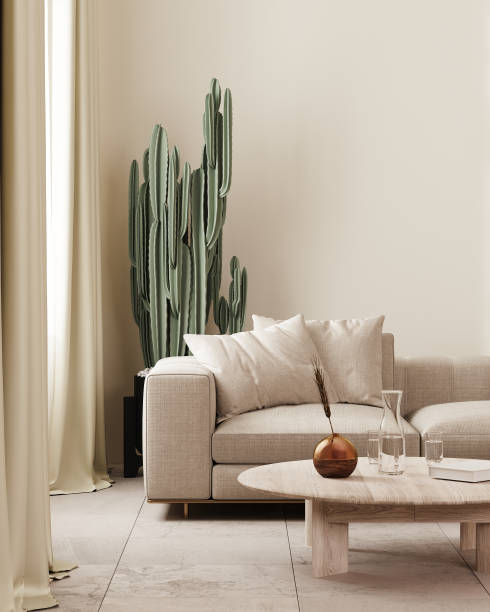 istock modern living room interior in beige tones with sofa and coffee table, curtains and cactus on background, 3d render 1475298917