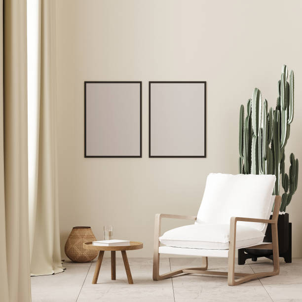 istock two poster frame mock up in boho style interior background with white armchair and coffee table near window ,beige wall, 3d render 1475298928