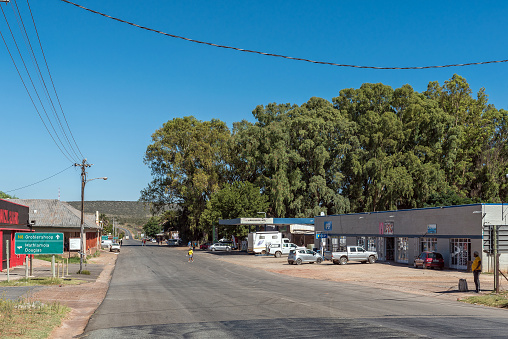 Griekwastad, South Africa - Feb 24, 2023: A street scene, with businesses and a gas station, in Griekwastad in the Northern Cape Province