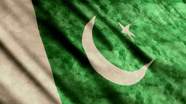 Pakistan Flag waving in the wind grunge version