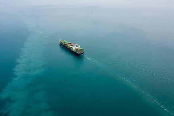 istock container ship carrying container box global business delivery service cargo by freight shipping commercial trade logistic and transportation over sea worldwide 1475304411