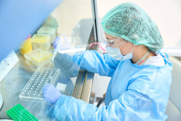 istock Hematologist works in a sterile diagnostic laboratory behind glass 1475306361