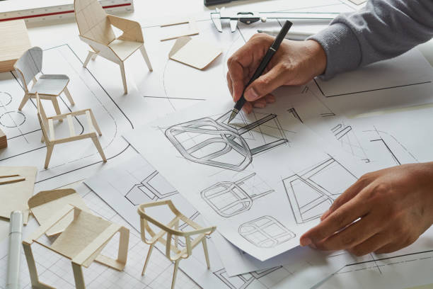 istock Designer sketching drawing design development product plan draft chair armchair Wingback Interior furniture prototype manufacturing production. designer studio concept . 1475306570
