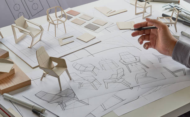 istock Designer sketching drawing design development product plan draft chair armchair Wingback Interior furniture prototype manufacturing production. designer studio concept . 1475306571
