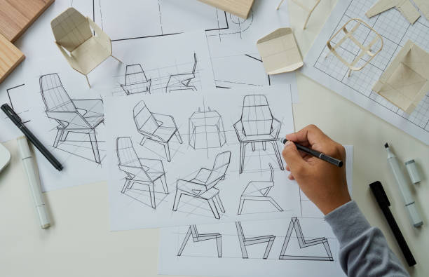 istock Designer sketching drawing design development product plan draft chair armchair Wingback Interior furniture prototype manufacturing production. designer studio concept . 1475306581
