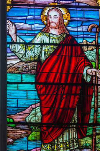 Stained glass window with Jesus Christ inside Gramado Stone church, Rio Grande do Sul, Southern Brazil