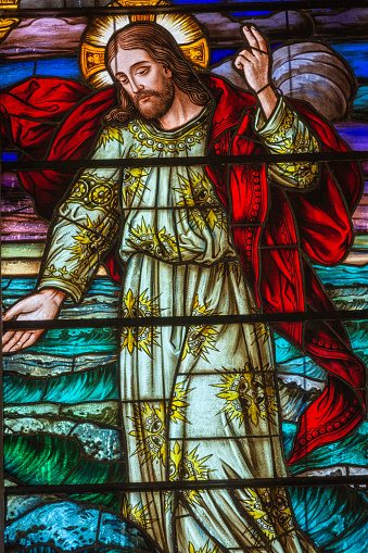 Stained glass window with Jesus Christ inside Gramado Stone church, Rio Grande do Sul, Southern Brazil