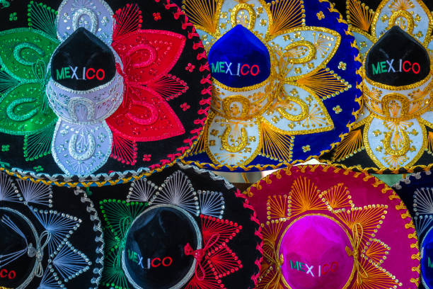 istock Colorful sombreros, mexican hats souvenirs pattern in a row, Cancun, Mexico 1475309032