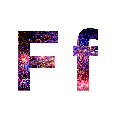 Letter F made from celebration happy new year and merry christmas firework isolated on black isolated background