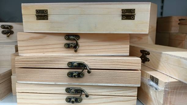 istock Wooden small boxes with a lock are on the counter in the store 1475312062
