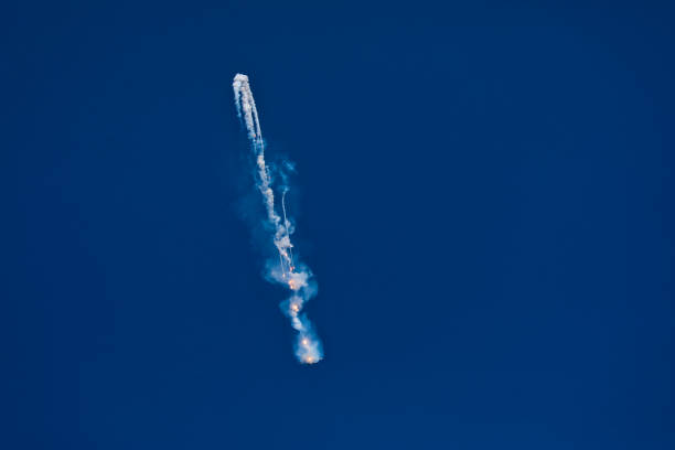 Fisher Aircraft releasing chaff as an evasive measure for heat seeking missiles high up in sky.