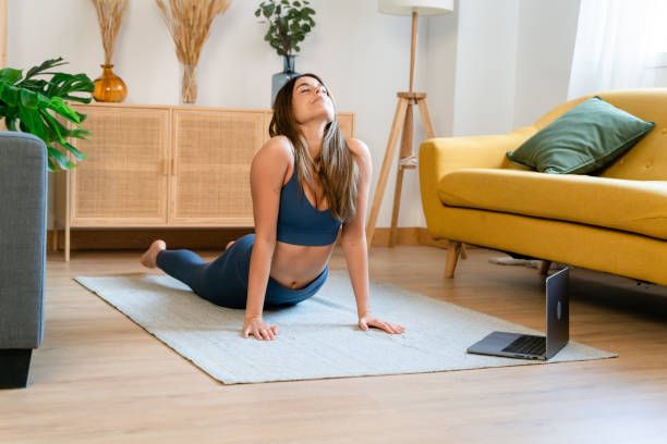 istock Woman doing yoga in pose 1475320640