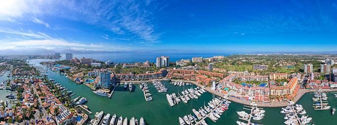 Marina Vallarta is a modern, planned urbanized area, known for its elegant hotels and resorts, sandy beaches, and a large marina housing luxury yachts.