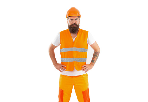 studio shot of puzzled builder wearing helmet. builder isolated on white background. builder man in uniform. bearded builder in orange vest.