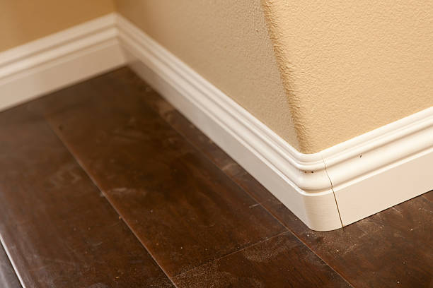 istock New Baseboard, Bull Nose Corners with Newly Installed Laminate Flooring 147533597