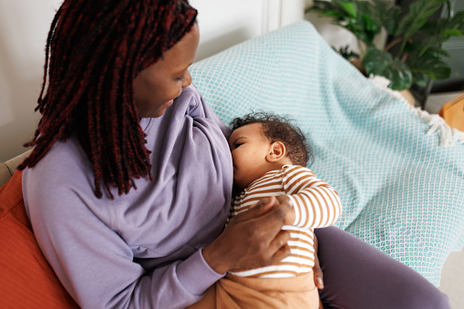 Mother breastfeeding baby