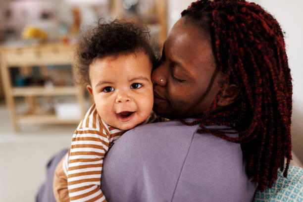 istock Mommy's little angel 1475340350