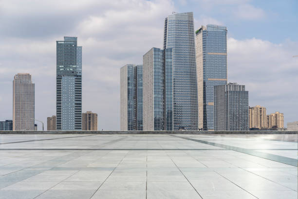 istock empty ground floor in front of modern office buildings exterior 1475341564