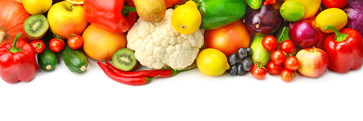 Set of vegetables and fruits isolated on white background. Free space for text. Wide photo.