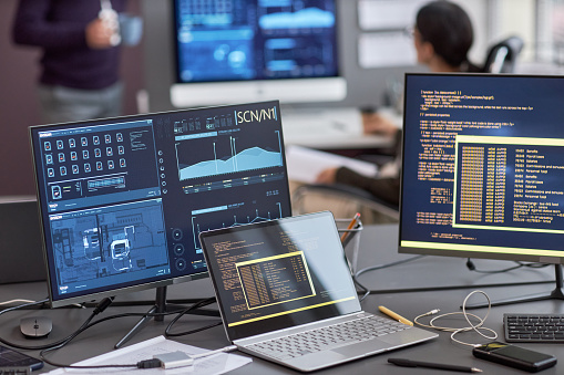 Background Image Of Multiple Computer Screens With Data And Code Stock ...