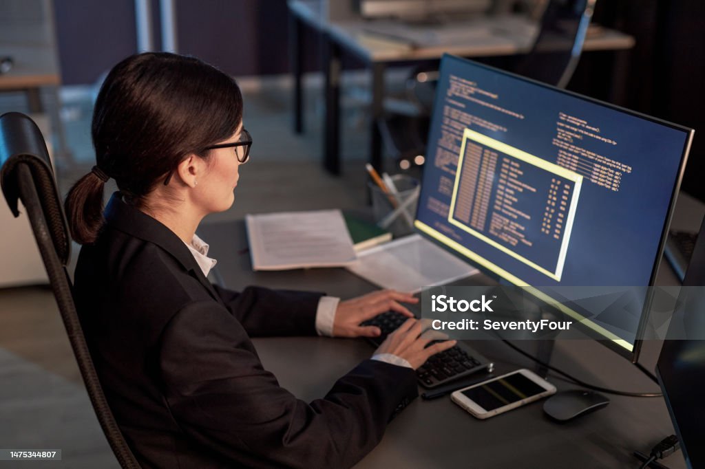 Software Developer At Work Female Software Developer Writing Code While Using Computer At ...