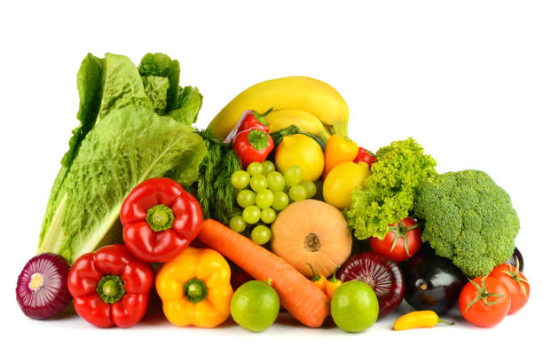 istock Useful fresh fruits and vegetables isolated on white 1475347265
