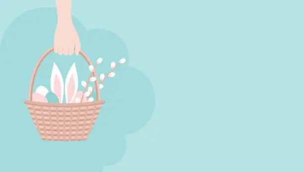 Vector illustration of Hand holding Easter basket with eggs, rabbit ears and branches of willow blossom, copy space. Vector illustration in flat style