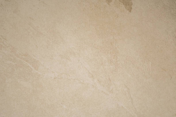 smooth neutral beige limestone texture wall background - grès photos et images de collection