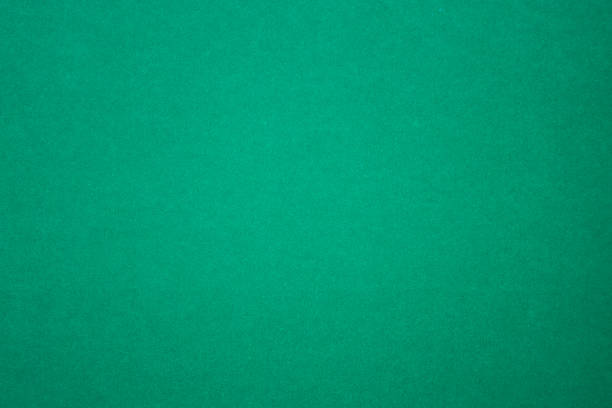 istock Dark Green Homogenous Paper Background with smooth color gradient 1475359588