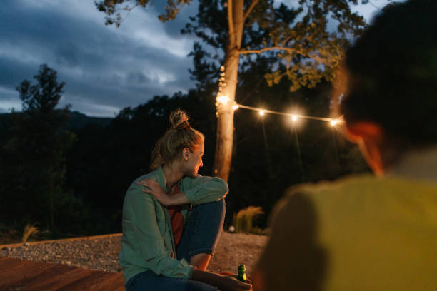 istock Evening with friends by campfire 1475361660