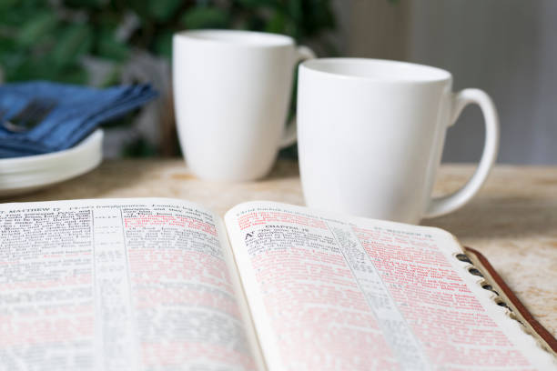 istock Friends share coffee and a snack as they study the Bible together. 1475362343