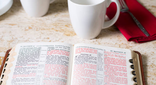 istock Friends share coffee and a snack as they study the Bible together. 1475362344