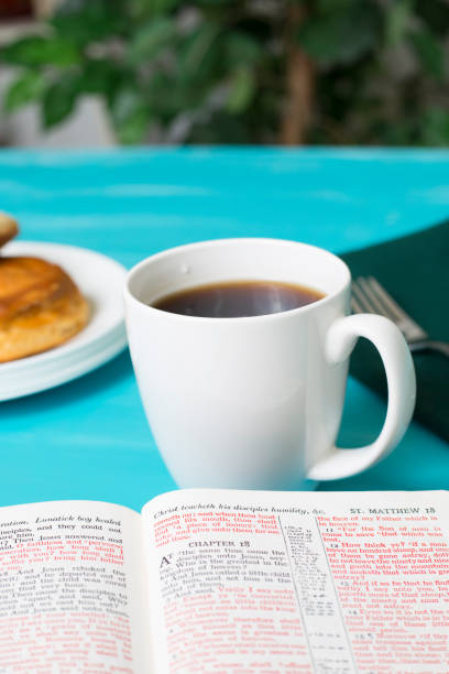 istock Friends share coffee and a snack as they study the Bible together. 1475362379