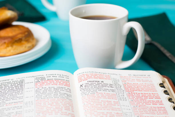 istock Friends share coffee and a snack as they study the Bible together. 1475362387