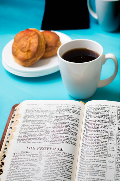 istock Friends share coffee and a snack as they study the Bible together. 1475362402