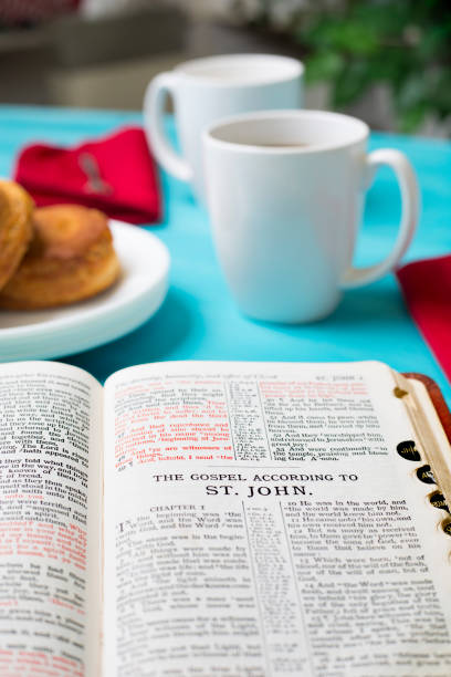 istock Friends share coffee and a snack as they study the Bible together. 1475362429
