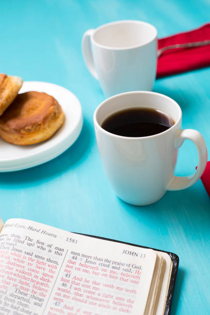 istock Friends share coffee and a snack as they study the Bible together. 1475362452